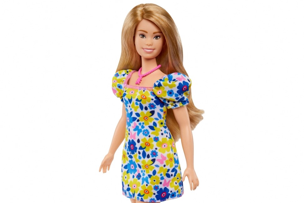 This undated image courtesy of Mattel, shows the company's newest Barbie doll, representing a person with Down syndrome, aimed at allowing more children to see themselves in the popular figure. (Photo by Jason Tidwell / MATTEL / AFP) 