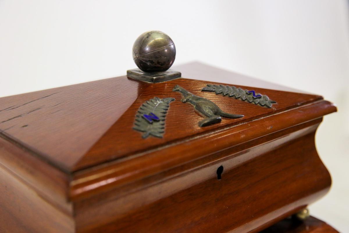 The century-old Australia and New Zealand ANZAC Football Ashes trophy, that was last sighted in 1954, in Sydney. | Photo Credit: AFP PHOTO/FOOTBALL AUSTRALIA

