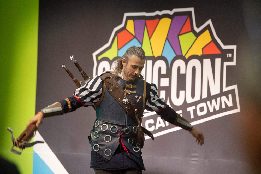 A man dressed up in a costume attends ComicCon Cape Town on April 27, 2023. (Photo by RODGER BOSCH / AFP)