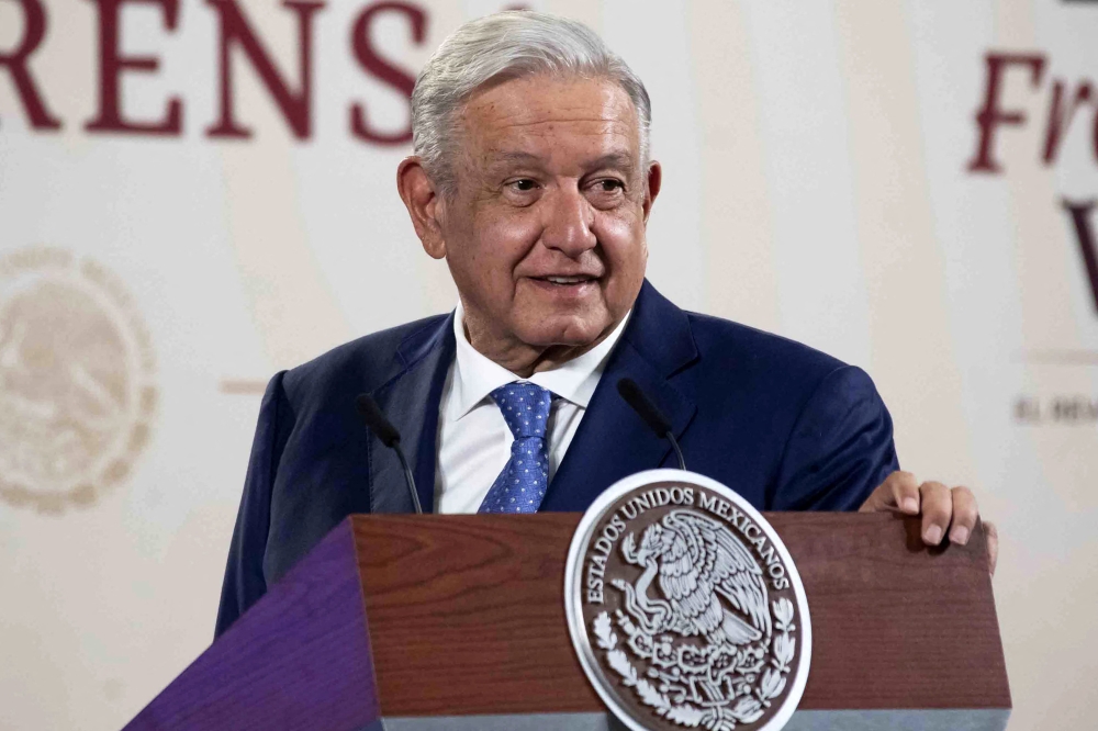 Handout picture released by Mexican Presidency press office showing Mexican President Andres Manuel Lopez Obrador during a press conference in Mexico City, on April 28, 2023, following his return to office after a Covid-19 infection. (Photo by Handout / Mexican Presidency / AFP) 
