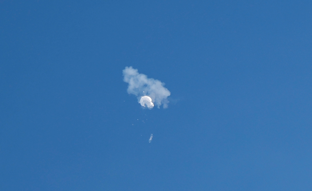 File Photo: The suspected Chinese spy balloon drifts to the ocean after being shot down off the coast in Surfside Beach, South Carolina, US, February 4, 2023. (REUTERS/Randall Hill)
