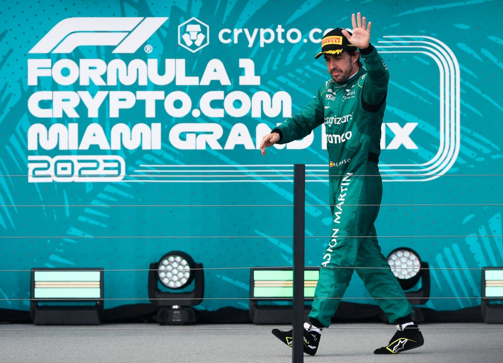 MAY 07: Third placed Fernando Alonso of Spain and Aston Martin F1 Team celebrates on the podium during the F1 Grand Prix of Miami at Miami International Autodrome on May 07, 2023 in Miami, Florida. Photo by Rudy Carezzevoli / GETTY IMAGES NORTH AMERICA / Getty Images via AFP