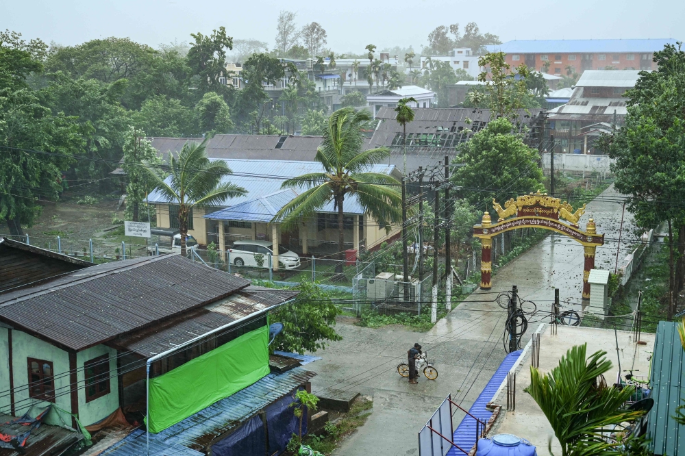 File photo: Shows a street in Kyauktaw in Myanmar (Photo by SAI Aung MAIN / AFP)
 