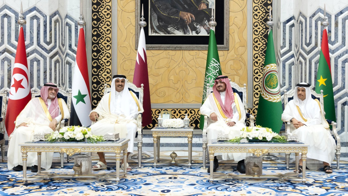 Amir H H Sheikh Tamim bin Hamad Al Thani (second left) after being welcomed upon arrival at King Abdulaziz International Airport in Jeddah, Saudi Arabia by Deputy Governor of Makkah Al Mukarramah region HRH Prince Badr bin Sultan bin Abdulaziz Al Saud and other officials. 