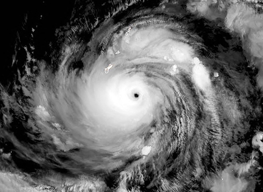This satellite image obtained from the The National Oceanic and Atmospheric Administration shows Typhoo Mawar, as it approached Guam on May 23, 2023, at 12:30 UTC. (Photo by Jose ROMERO / NOAA/RAMMB / AFP)