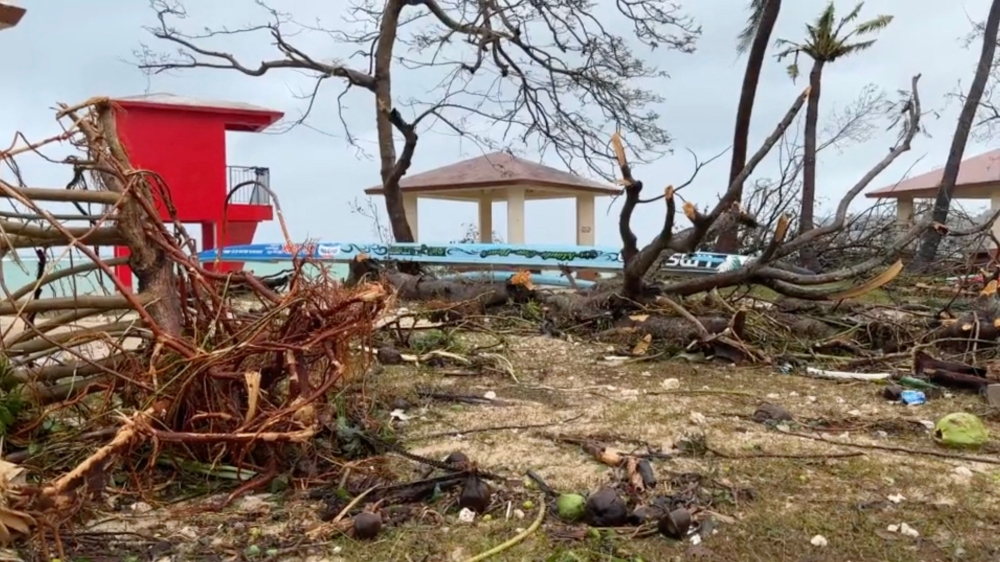This video capture from James Reynolds' Twitter page @EarthUncutTV shows damage on the shoreline caused by high winds and precipitation a day after Typhoon Mawar passed over Tumon Bay, Guam, May 25, 2023. Photos by James REYNOLDS / AFP

