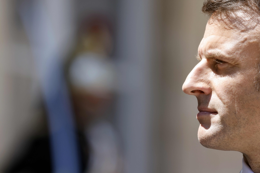 French president Emmanuel Macron gives a press conference following his meeting with his Lithuanian counterpartat the Elysee Palace in Paris on May 24, 2023. (Photo by Ludovic Marin / AFP)