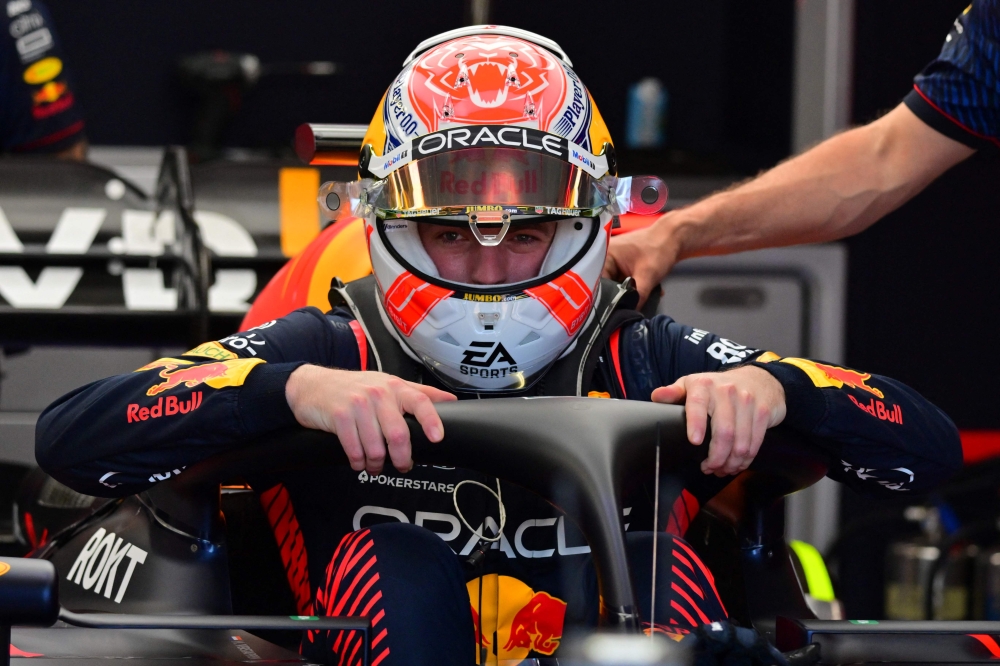 Red Bull Racing's Dutch driver Max Verstappen enters his car in the pits ahead of the third practice session of the Formula One Monaco Grand Prix at the Monaco street circuit in Monaco, on May 27, 2023. (Photo by ANDREJ ISAKOVIC / AFP)