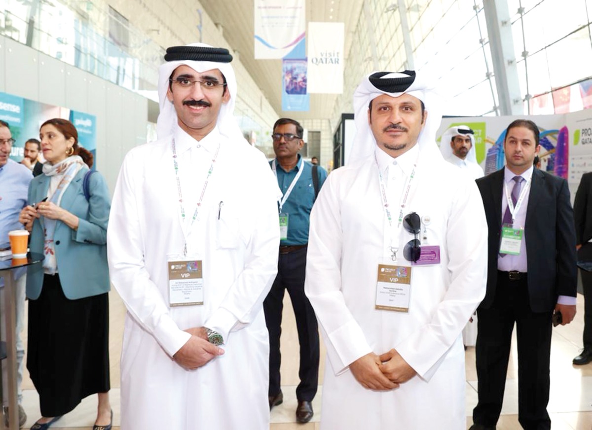 Officials at the Project Qatar 2023 exhibition.