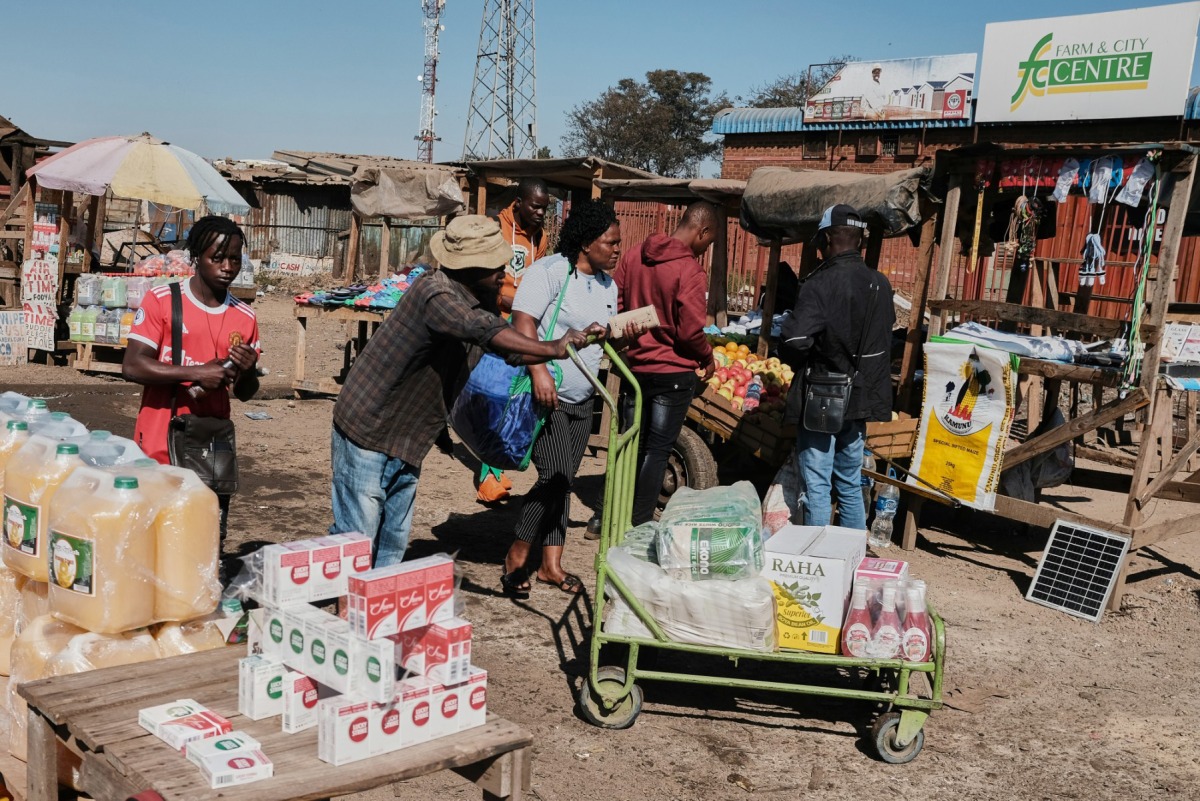 Roadside vendors sell goods at Mbare Musika in Harare on May 25, 2023. Photo by Jekesai NJIKIZANA / AFP