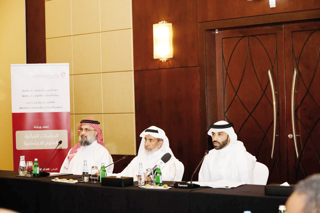 Minister of Awqaf and Islamic Affairs H E Ghanem bin Shaheen Al Ghanem (centre) and Director of Ibn Khaldon Centre for Humanities and Social Sciences Dr. Nayef Nahar Al Shammari (right) during the workshop in Doha, yesterday. 