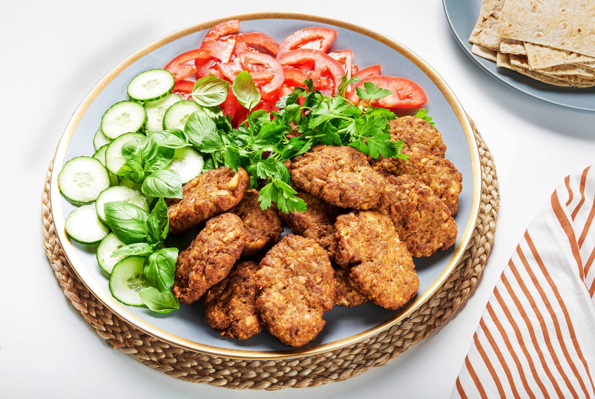 Lightly spiced and served with crunchy vegetables and fresh herbs, kotlet are great for road trips and picnics. Rey Lopez/The Washington Post 
