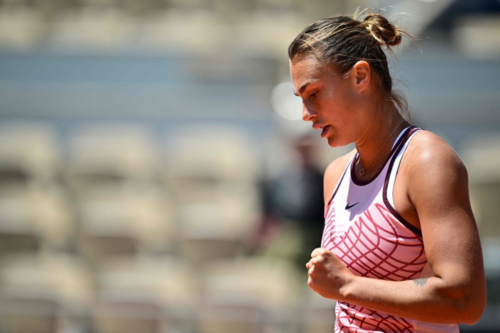 Belarus' Aryna Sabalenka reacts after a point to Russia's Kamilla Rakhimova during their women's singles match on day six of the Roland-Garros Open tennis tournament at the Court Philippe-Chatrier in Paris on June 2, 2023. Photo by JULIEN DE ROSA / AFP