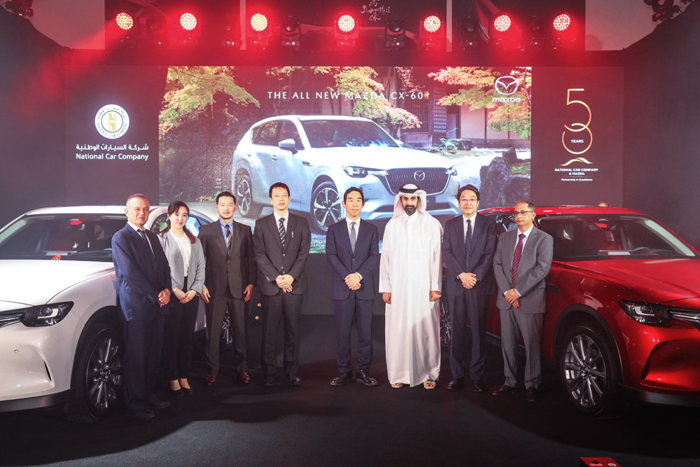 The Ambassador of Japan to Qatar, H E Satoshi Maeda; and Sheikh Ahmed bin Nasser Al Thani, President-Director of National Car Company, with other officials during the launch of Mazda CX-60 at the Mazda Show room in Al Nasr Street, Doha.