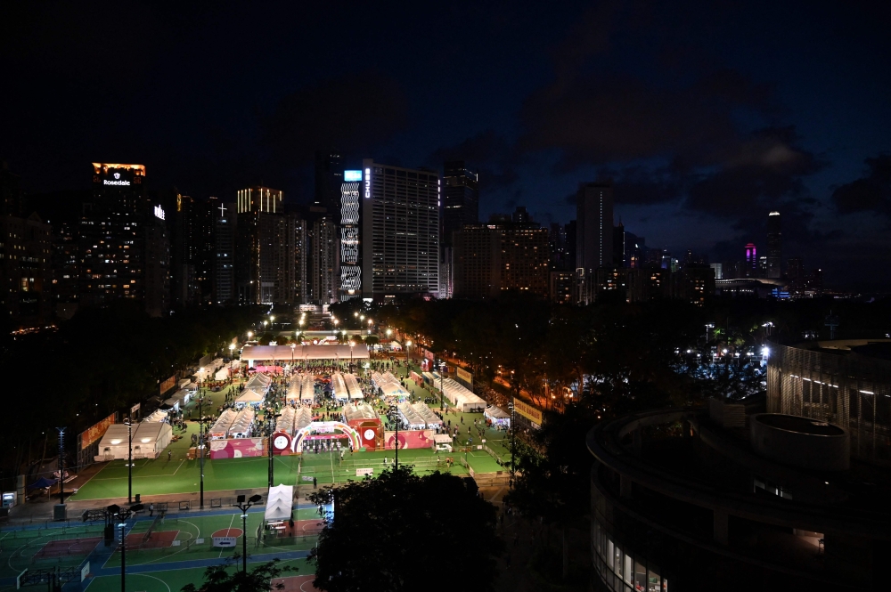A fair is being held in Victoria Park in the Causeway Bay district of Hong Kong on June 4, 2023, where Hong Kong people traditionally gather annually to mourn the victims of China's Tiananmen Square crackdown in 1989 which the authorities have banned and vowed to stamp out any protests on the anniversary on June 4. (Photo by Peter PARKS / AFP)
 
