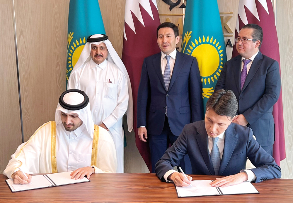 IPA Qatar and Kazakh Invest officials during the signing ceremony.