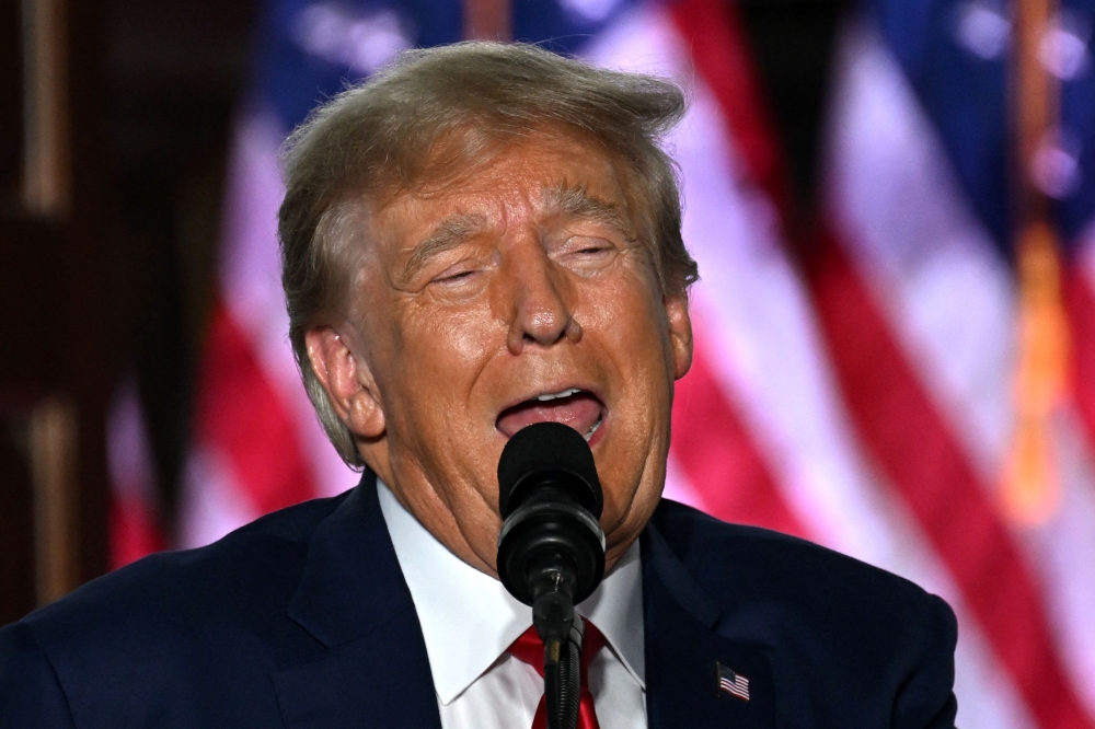 Former US President Donald Trump delivers remarks at Trump National Golf Club Bedminster in Bedminster, New Jersey, on June 13, 2023. (Photo by Ed Jones / AFP)