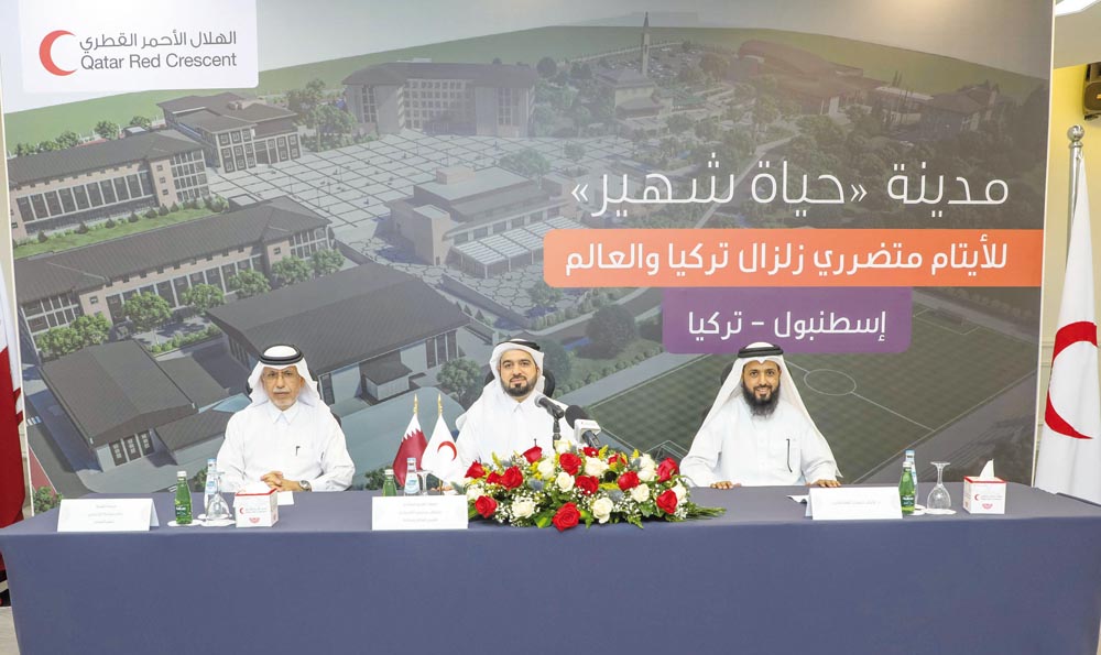 From right: Head of the Hayatı Sehir City Project Dr. Ayedh Dabsan Al Qahtani,  Acting Secretary-General of the QRC Faisal Mohamed Al Emadi and Editor-in-Chief of Al Sharq Newspaper Jaber Al Harami during the press conference.