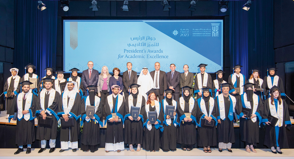 University of Doha for Science and Technology’s (UDST) highest achieving graduands of the Class of 2023 with Dr. Salem Al Naemi, President of UDST and academic staff. 