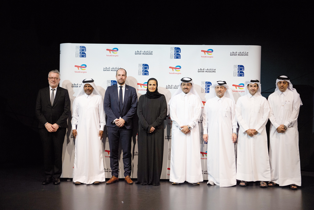 H E Sheikha Al Mayassa bint Hamad bin Khalifa Al Thani, Chairperson of Qatar Museums (fourth left); H E Dr. Mohamed bin Saleh Al Sada, President of the Dadu Advisory Committee (fourth right); Ahmad Al Namla, CEO of Qatar Museums (third right); Matthieu Bouyer, Managing Director of TotalEnergies EP Qatar and Country Chair (third left), along with other officials during the signing of the partnership between TotalEnergies Qatar and Qatar Museums