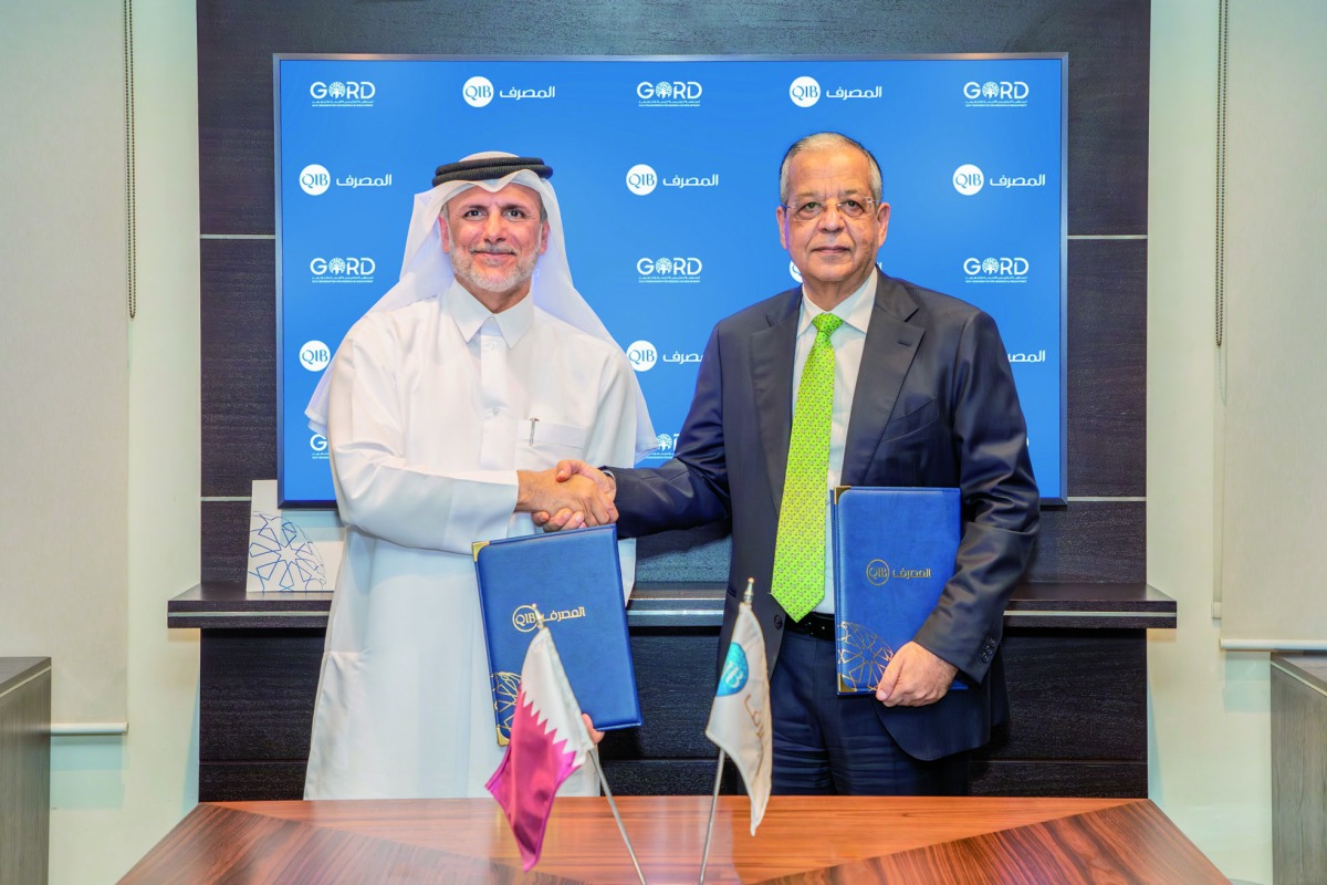 Tarek Y. Fawzi, Chief Wholesale Banking Officer, QIB and Dr. Yousef Alhorr, Founding Chairman of GORD during the signing ceremony. 