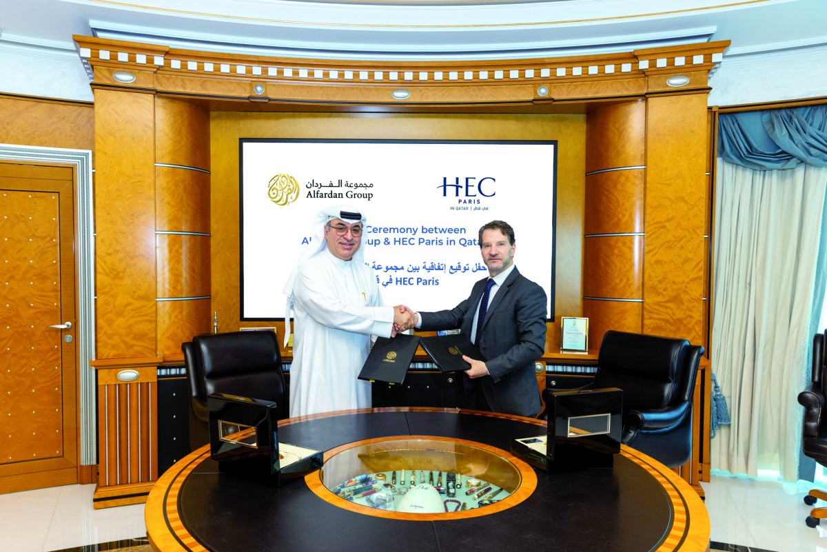 Omar Hussain Alfardan, President and CEO of Alfardan Group and Dr. Pablo Martin de Holan, Dean of HEC Paris in Qatar during the meeting to formalise the MoU.  