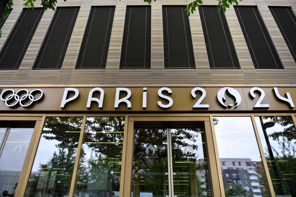 This photograph shows the entrance of the headquarters of the Paris 2024 Olympics headquarters as Police raided just over a year out from the opening ceremony of the quadrennial sporting showpiece, in Saint-Denis, northern Paris, on June 20, 2023. (Photo by Julien De Rosa / AFP)