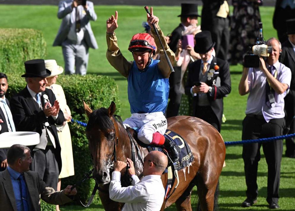 Jockey Frankie Dettori guides Gregory to win the Queen Vase Group 2 race.