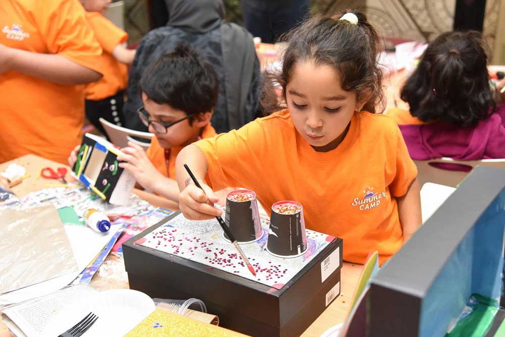 Children engage in an activity at the Summer Camp.