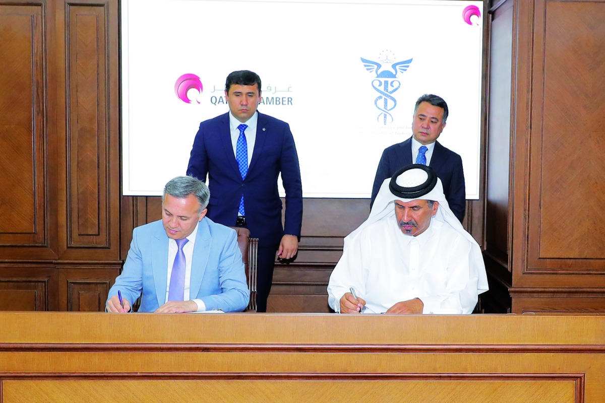 QC and JBC officials during the agreement signing ceremony held yesterday at the QC headquarters.