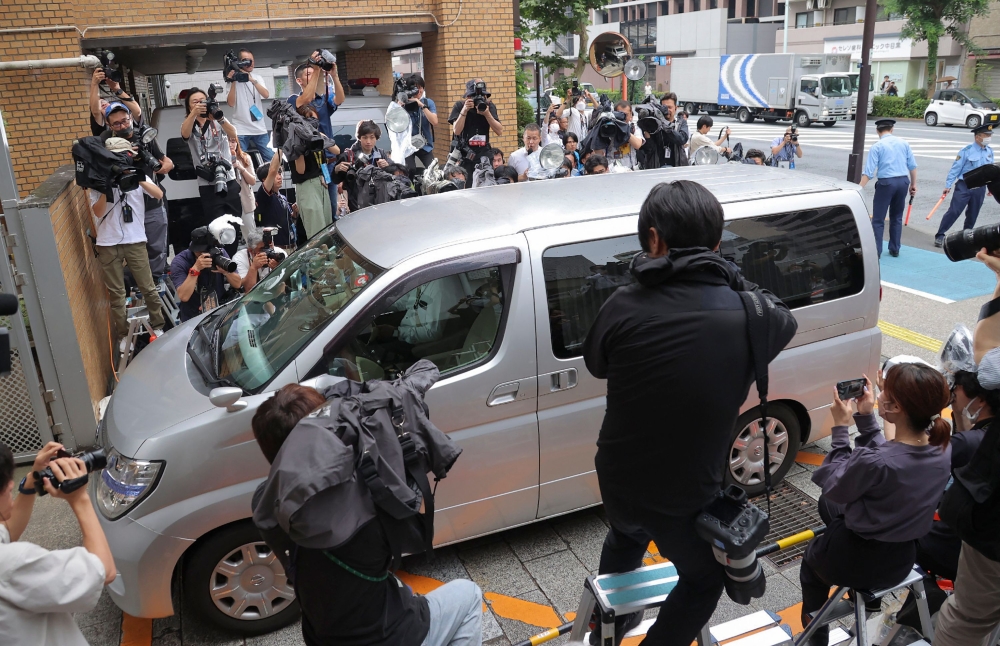 A vehicle believed to carry Japanese Kabuki actor Ennosuke Ichikawa enters the Metropolitan Police Department Meguro Police Station in Tokyo on June 27, 2023. (Photo by JIJI Press / AFP)