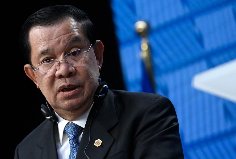 Cambodian Prime Minister Hun Sen speaks at a press conference during the EU-ASEAN (Association of Southeast Asian Nations) summit at the European Council headquarters in Brussels on December 14, 2022.  (Photo by John Thys / AFP)