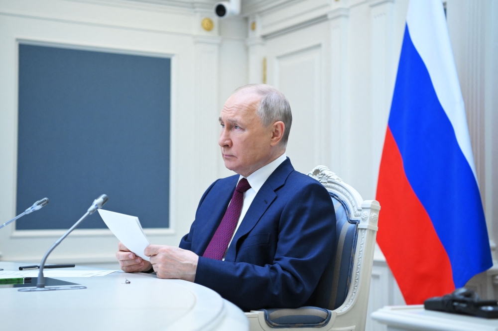 Russian President Vladimir Putin attends a meeting of the Shanghai Cooperation Organisation (SCO) Heads of State Council via a video conference at the Kremlin in Moscow on July 4, 2023. (Photo by Alexander Kazakov / SPUTNIK / AFP)
