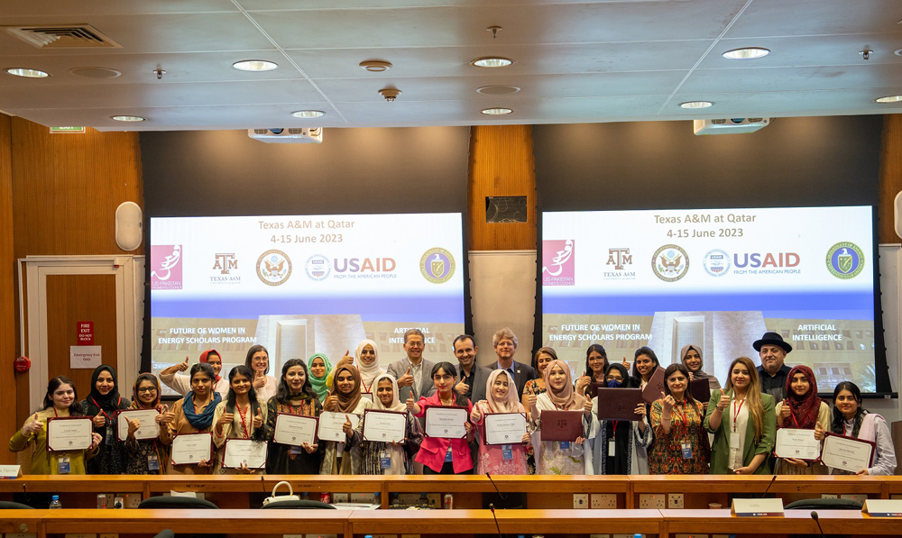 Programme participants and officials at an event. 