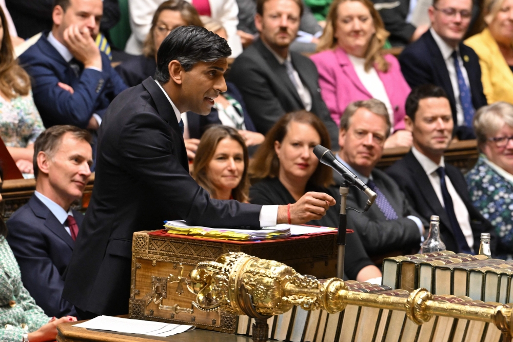 A handout photograph released by the UK Parliament shows Britain's Prime Minister Rishi Sunak speaking during Prime Minister's Questions (PMQs), in the House of Commons, in London, on July 19, 2023. (Photo by JESSICA TAYLOR / UK PARLIAMENT / AFP)