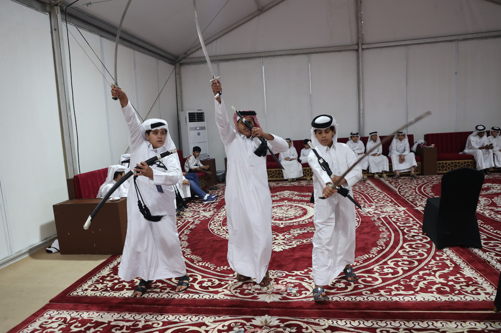 Children practising Ardha.