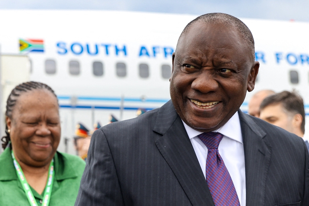 South Africa's President Cyril Ramaphosa is welcomed upon arrival at Pulkovo airport ahead of the second Russia-Africa summit, in Saint Petersburg on July 26, 2023. (Photo by Peter KOVALEV / TASS Host Photo Agency / AFP)
