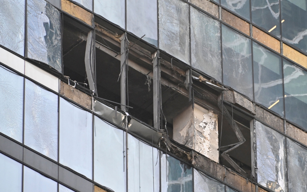 A view of a damaged office block of the Moscow International Business Center (Moskva City) following a reported drone attack in Moscow on August 1, 2023. (Photo by Alexander NEMENOV / AFP)
