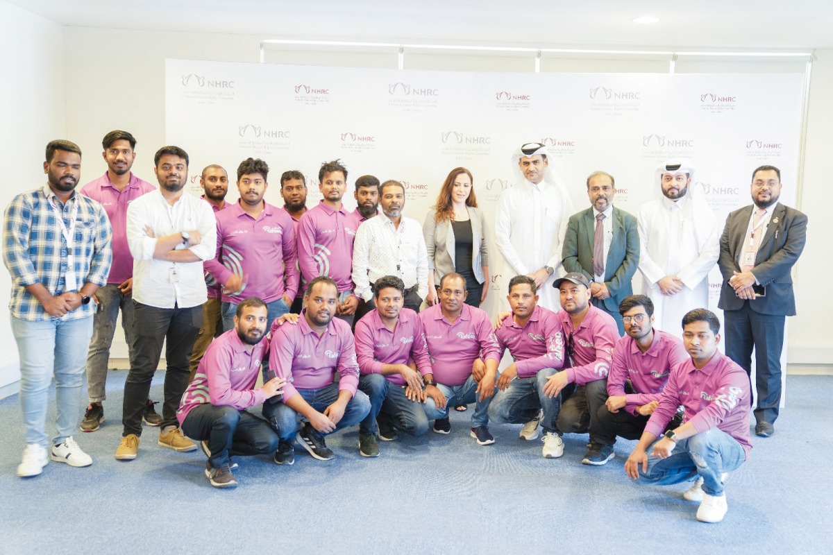 NHRC officials with employees of delivery firms during the meeting.