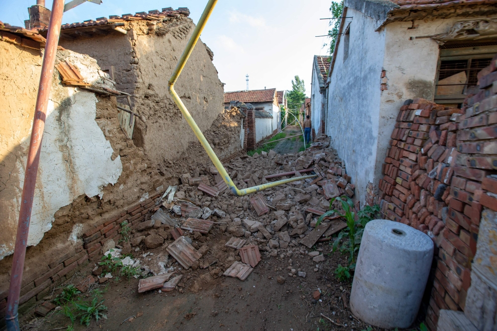 Damaged houses are seen in Pingyuan county, Dezhou city, in China's eastern Shandong province, on August 6, 2023, following a 5.4-magnitude earthquake that shook eastern China. (Photo by AFP) / China OUT
