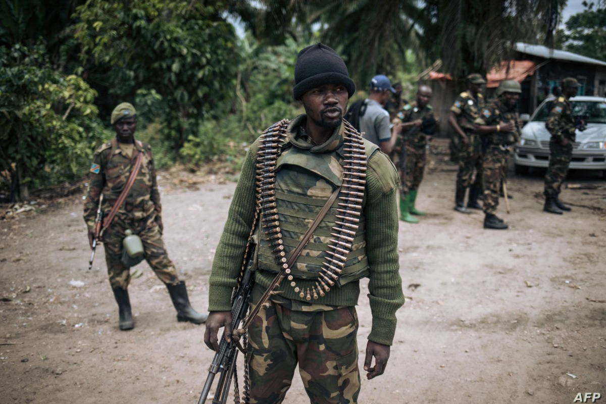 A Democratic Republic of Congo soldier is seen on patrol in the village of Manzalaho, near Beni, on February 18, 2020, following an alleged attack by members of the Allied Democratic Forces (ADF) rebel group. File photo / AFP

