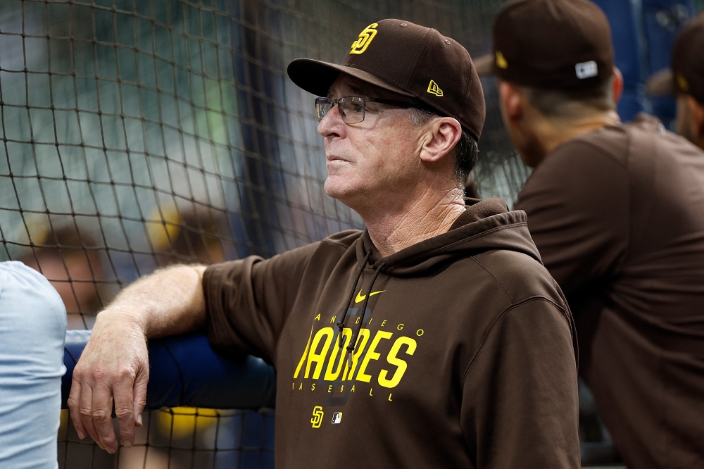 Manager Bob Melvin #3 of the San Diego Padres watches batting practice before the game against the Milwaukee Brewers at American Family Field on August 26, 2023 in Milwaukee, Wisconsin. (Photo by John Fisher / GETTY IMAGES NORTH AMERICA / Getty Images via AFP)