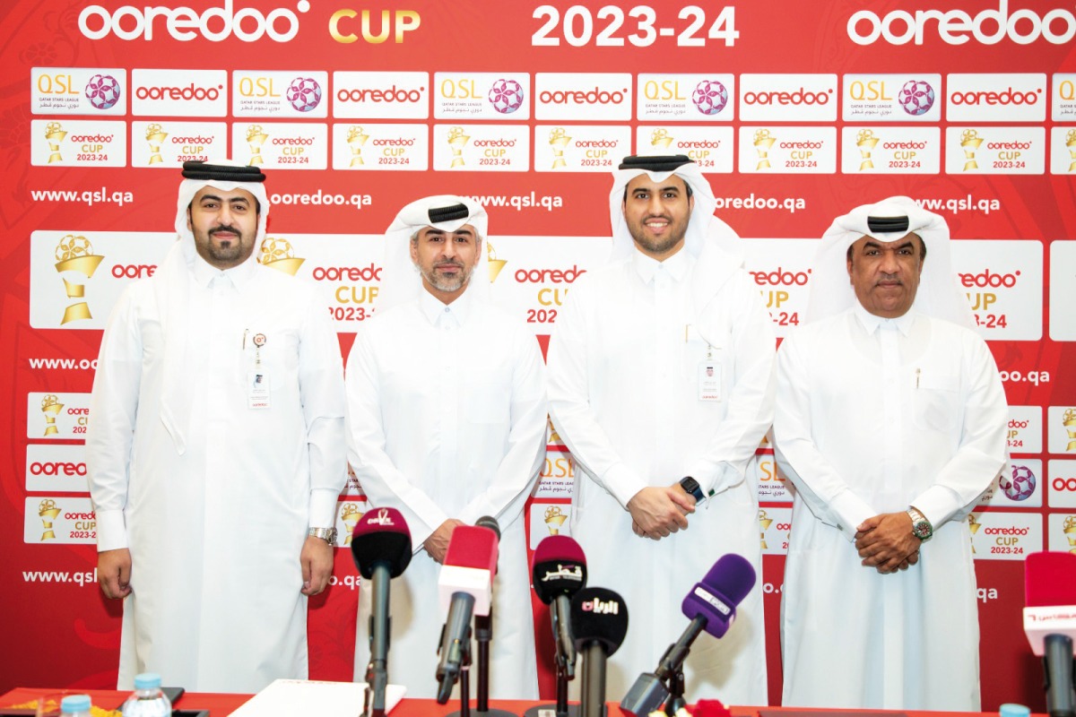 Ooredoo and QSL officials during the agreement signing ceremony.