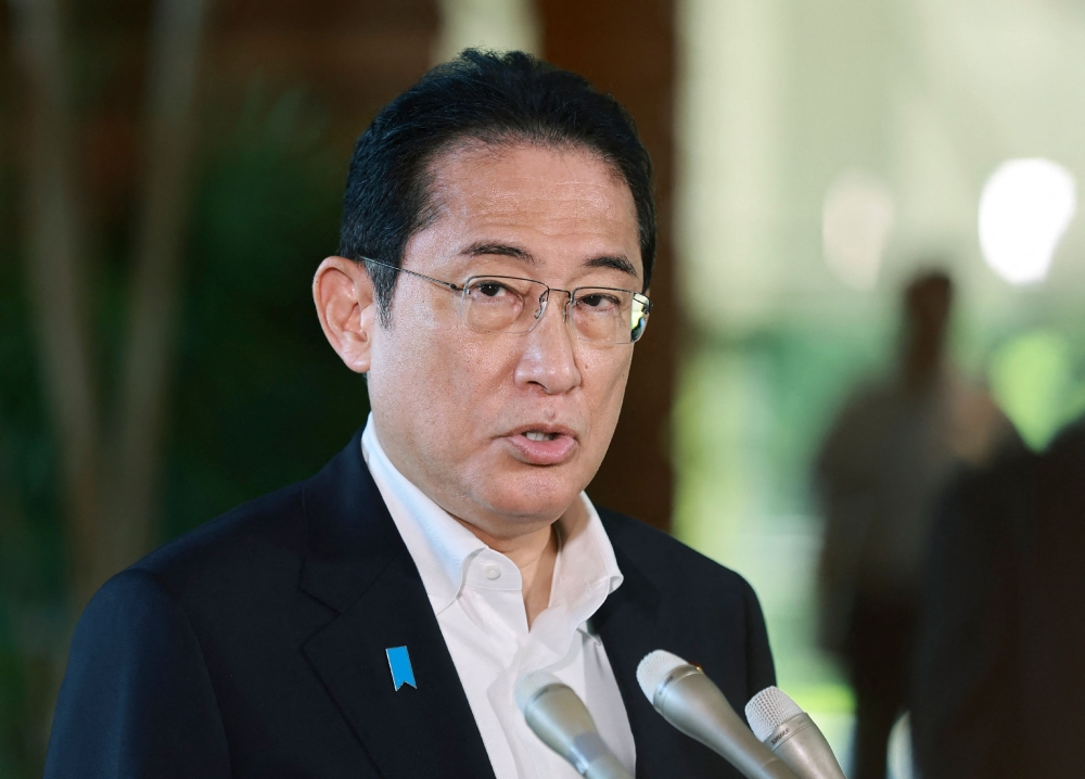Japan's Prime Minister Fumio Kishida speaks to reporters about North Korea's ballistic missile launches at the prime minister's office in Tokyo on August 31, 2023. Photo by JIJI Press / AFP