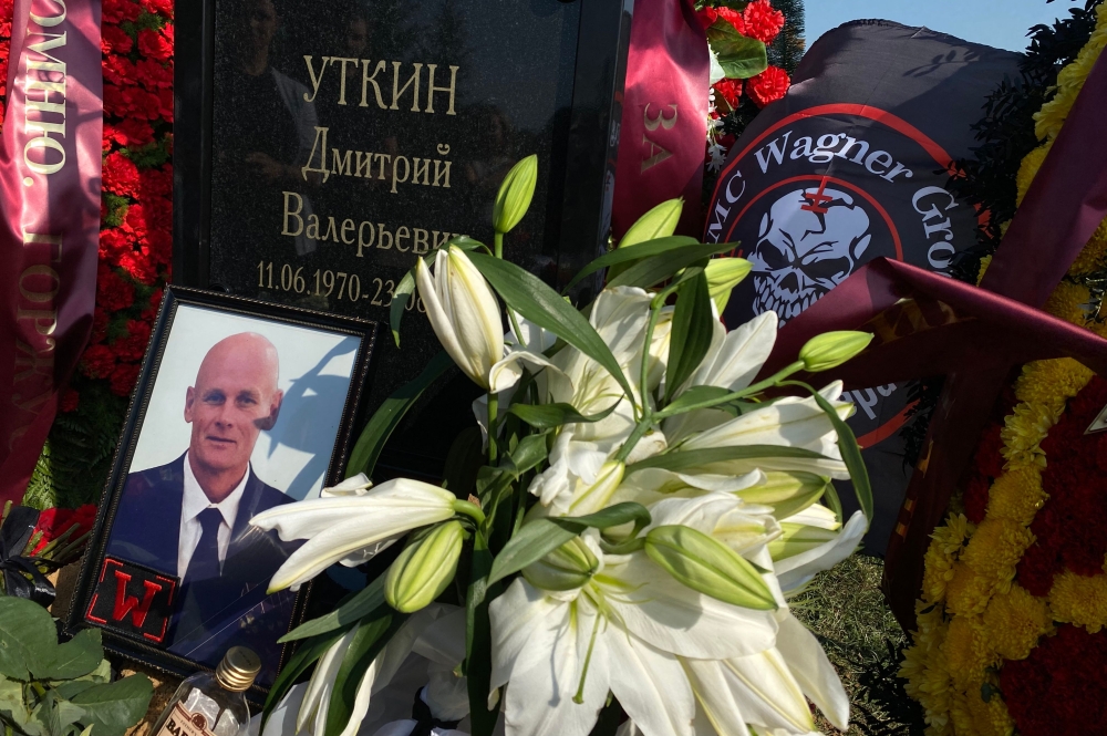 A view shows the grave of Wagner private mercenary group military commander Dmitry Utkin, who was killed in a private jet crash in the Tver region last week, at the Federal Military Memorial Cemetery in the Moscow region on August 31, 2023. (Photo by Natalia KOLESNIKOVA / AFP)
