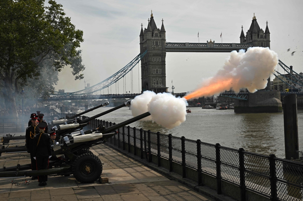 A 62 Gun Royal salute is fired from Tower Wharf, beside The Tower of London by the Honourable Artillery Company, British Army, taking place to mark the first anniversary of His Majesty The King's accession to the throne, in London on September 8, 2023. (Photo by Daniel Leal / AFP)