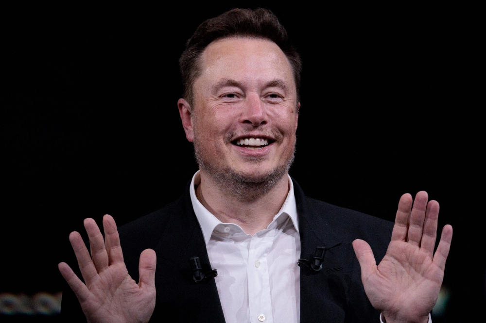 File Photo: SpaceX, Twitter and electric car maker Tesla CEO Elon Musk. ((Photo by Joel Saget / AFP)