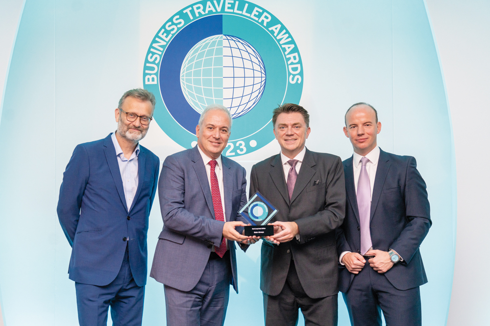 Qatar Airways officials receiving the award.