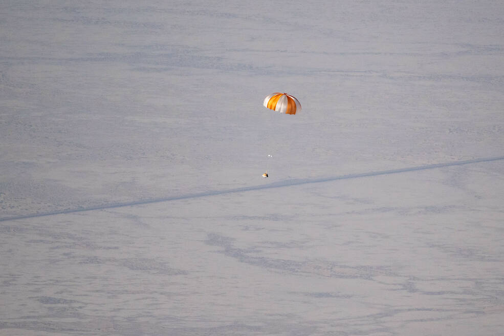 A training model of the OSIRIS-REx sample return capsule seen during a drop test on Aug. 30, 2023, at the Department of Defense's Utah Test and Training Range in preparation for the retrieval of the actual capsule on Sept. 24. Credits: NASA/Keegan Barber
