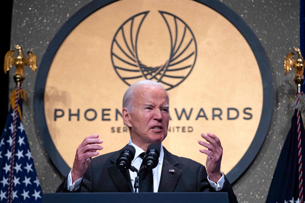 US President Joe Biden speaks during the Phoenix awards dinner at the Washington Convention Center in Washington, DC on September 23, 2023. (Photo by ROBERTO SCHMIDT / AFP)
